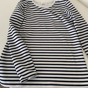 Long sleeve black and white shirt.